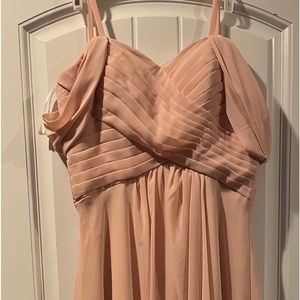 Formal dress for a wedding worn once. Blush pink size 2.